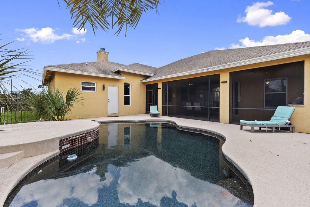 Photo of 2725 SW Rosser Boulevard, Port Saint Lucie, FL 34953 (MLS # R11108845)