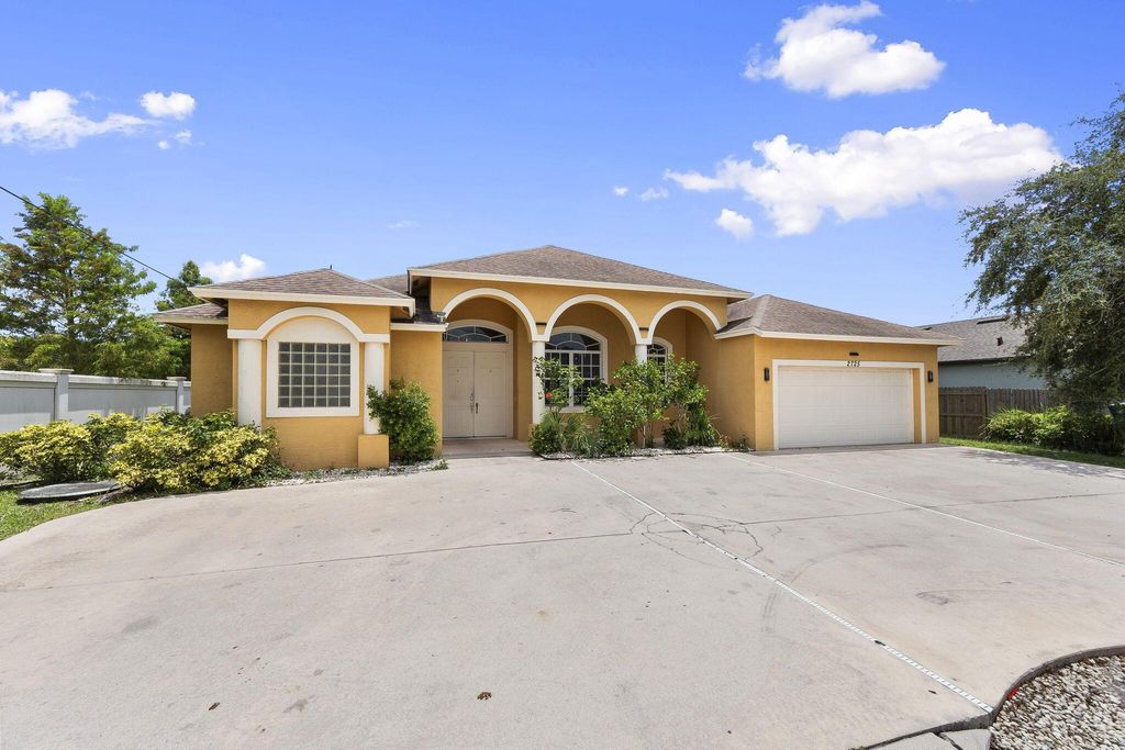 Photo of 2725 SW Rosser Boulevard, Port Saint Lucie, FL 34953 (MLS # R11108845)