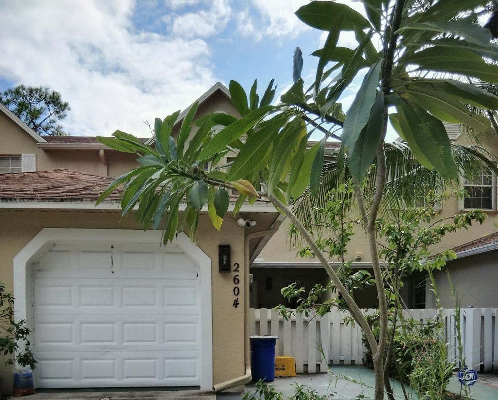 Photo of 2604 N Maplewood Drive, Greenacres, FL 33415 (MLS # B26088550)