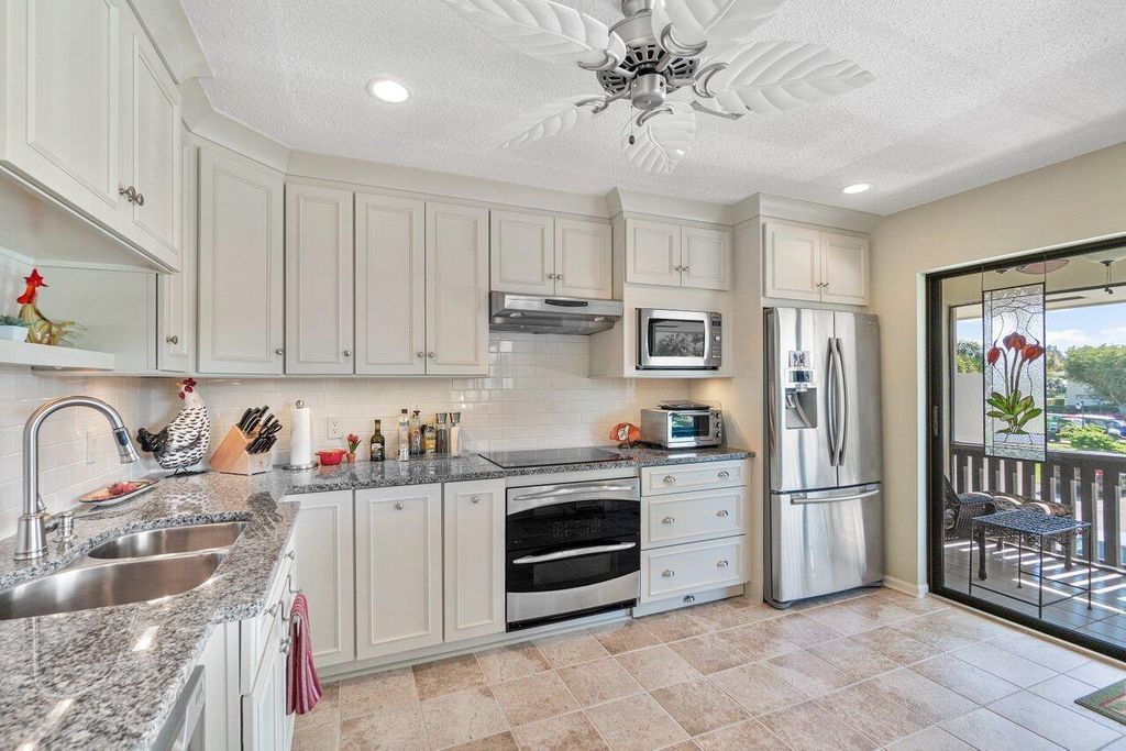 Photo of 3720 Quail Ridge Drive N #Green Heron S, Boynton Beach, FL 33436 (MLS # R10776761)