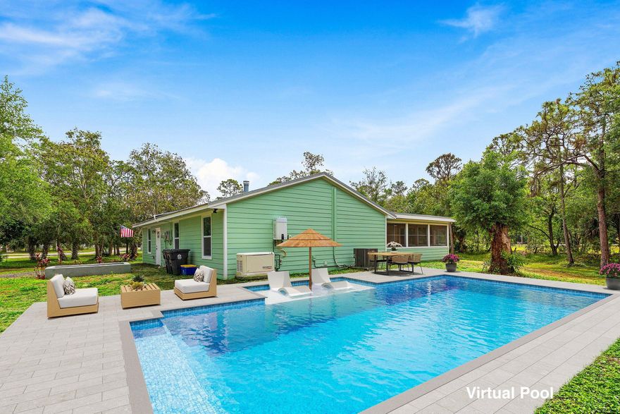 WELCOME HOME This like new and well-appointed key west style home is resting on a premium 1.88 acre oversized lot and boasting (4) true bedrooms, (2) full baths, modern updating, luxury upgrades, plus; 2023 metal roof, 2023 hurricane impact windows throughout, 2023 solar panels, 2024 whole house 22KW Generic generator, 2023 AC system and ductwork, 2023 tankless water heater, 2023 Icynene insulation, 2024 LP 500 gallon propane tank and this beauty is in a superb location on a paved road! ENTERING the convenient circular driveway, you will discover that this rare find is resting on a high and dry lot with no pond. Then you will be met by the covered front patio that bring you inside where you are greeted by a freshly painted interior and lovely color palette, 2023 luxury waterproof (CLICK) vinyl flooring throughout, high-end flat wall finish and spectacular 21' x 9' 2023 kitchen featuring: custom 42" cabinetry with vented commercial grade range hood, soft close cabinets and drawers, spacious 11' x 3' island with five person bar, electric, microwave, quartz countertops, 2024 stainless steel appliance package, (2) extra-large pantries, gas or electric connection for oven and quaint breakfast nook. PASSING THROUGH you will find a modern feel, living/dining room with a relaxing wood burning fireplace, dynamite split floor plan with dual primary suites, multiple walk-in closets, built-in desk, convenient 19'x9' under AC laundry room equipped with washer, dryer, 11'x3' folding counter, cabinetry, utility sink and large closet/pantry and you will discover stepping into the very spacious 32' x 18' Forida room windows galore, loads of natural lighting and abundant green space views. PLUS, it could (easily) be converted into 576sqft under AC with a mini split. BONUS the owner is offering a new mini split at wholesale cost to the buyer for approximately $2K and this gem is move in ready! STEPPING OUTSIDE brings you into a your very own private oasis... Pergola with brick paver patio, charming 11' x 20' matching shed, high and dry oversized lot with no pond and countless mature trees such as; white oak, live oak, rainbow eucalyptus tree, sable palms, orchid tree, triple robellini palms, pine trees and many others. Simply, a perfect space for quiet time, cozy fires, family gatherings, entertaining and enjoying Florida living at its best. HELLO EXTRAS, SAVINGS, PEACE OF MIND & CONVENIENCE New fans, fixtures, and systems throughout, countless green energy efficient features, average monthly electric bill ONLY $40 - $50.00, new water filtration and well pump, outside gas grill hookup, 2023 electrical panel, concrete septic tank, all flooring includes additional waterproof barrier, whole house generator ensuring uninterrupted power supply, built for efficiency, luxury and durability, convenient sidewalk and a 2023 Zip System Sheathing and 2023 hardie board/fiber cement that is boasting an impressive 19R siding value and offers superior durability, fire resistance, and low-maintenance protection for homes. Engineered for climate, it resists damage from moisture, pests, rot, and winds up to 130 mph. It also offers high aesthetic appeal with wood-like textures and so much more! LOCATION LIFESTYLE FREEDOM The Acreage is located in Palm Beach County, which is home to one of Florida's best public-school systems and some of the country's most rigorous public magnet and private schools in the nation as recognized by U.S. New & World Report, the New York Times and sitting just a few miles away from the Palm Beach State College. And from your own yard residents can enjoy year-around farm-to-table living, taking classes in the community and learning about the full spectrum of food production and healthy eating. Along with, this gem is just minutes to everything one could possibly desire; shopping and dining just around the corner and nine quaint parks with countless year-round outdoor activities such as; free concerts at the community amphitheater, play grounds and picnic areas with grill pavilions, fishing, skate and equestrian parks, fitness and equestrian trails, football, baseball and soccer fields, tennis, basketball, volleyball and racquetball courts and is located just minutes to everything one could possibly desire; Florida's Turnpike, I-95, Palm Beach international Airport, arts, entertainment, world class equestrian shows and facilities, beaches, theater, golf, business and economic development, education, green living and countless activities for all ages, Simply, the best of everything and your perfect Florida retreat. COME EXPERIENCE THE DIFFERENCE Breathe in the fresh country air, enjoy the peaceful surroundings, and discover why The Acreage is one of Palm Beach County's most sought-after communities. Build a pool, shop, guest house and bring your toys, pets or just about anything your heart desires... The possibilities are endless and there is no HOA! Come and enjoy your life away from the hustle and bustle and your evenings gazing at the stars. Happy Home Hunting!