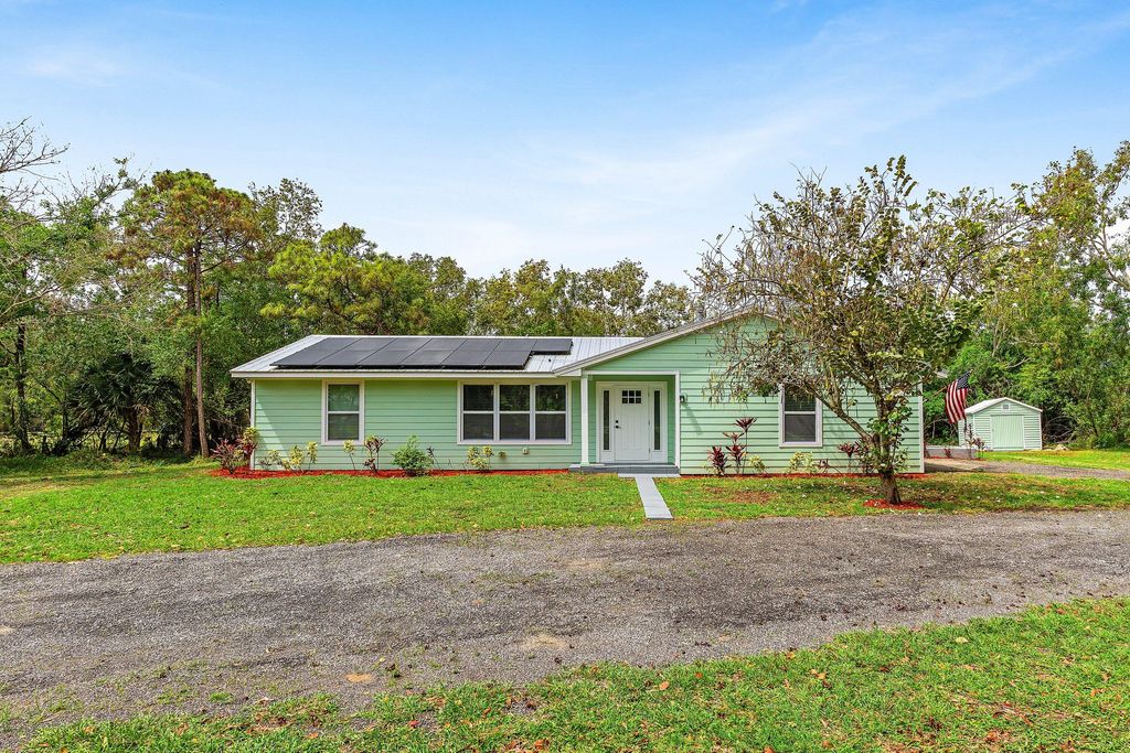 Photo of 4397 Avocado Boulevard, West Palm Beach, FL 33411 (MLS # B26016954)