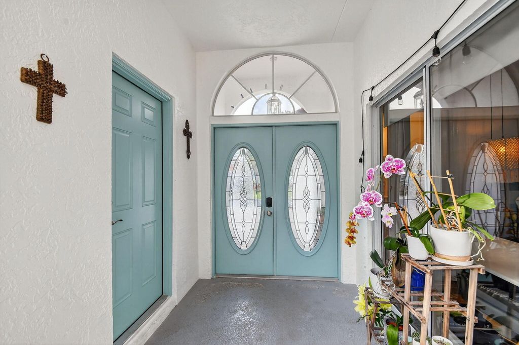 Photo of 2769 Pointe Circle, Greenacres, FL 33413 (MLS # B26011628)
