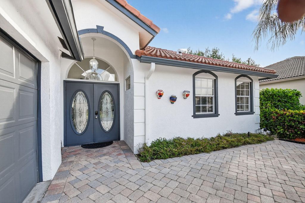 Photo of 2769 Pointe Circle, Greenacres, FL 33413 (MLS # B26011628)