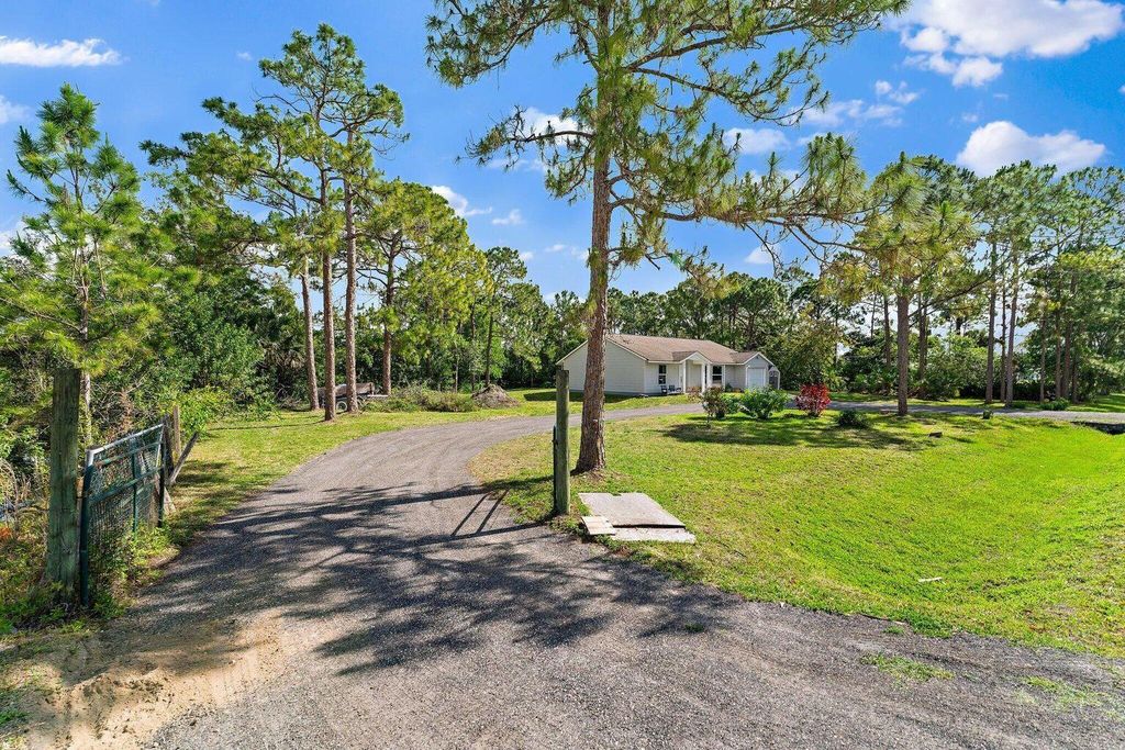 Photo of 12247 78th Place N, Loxahatchee, FL 33470 (MLS # R11100288)