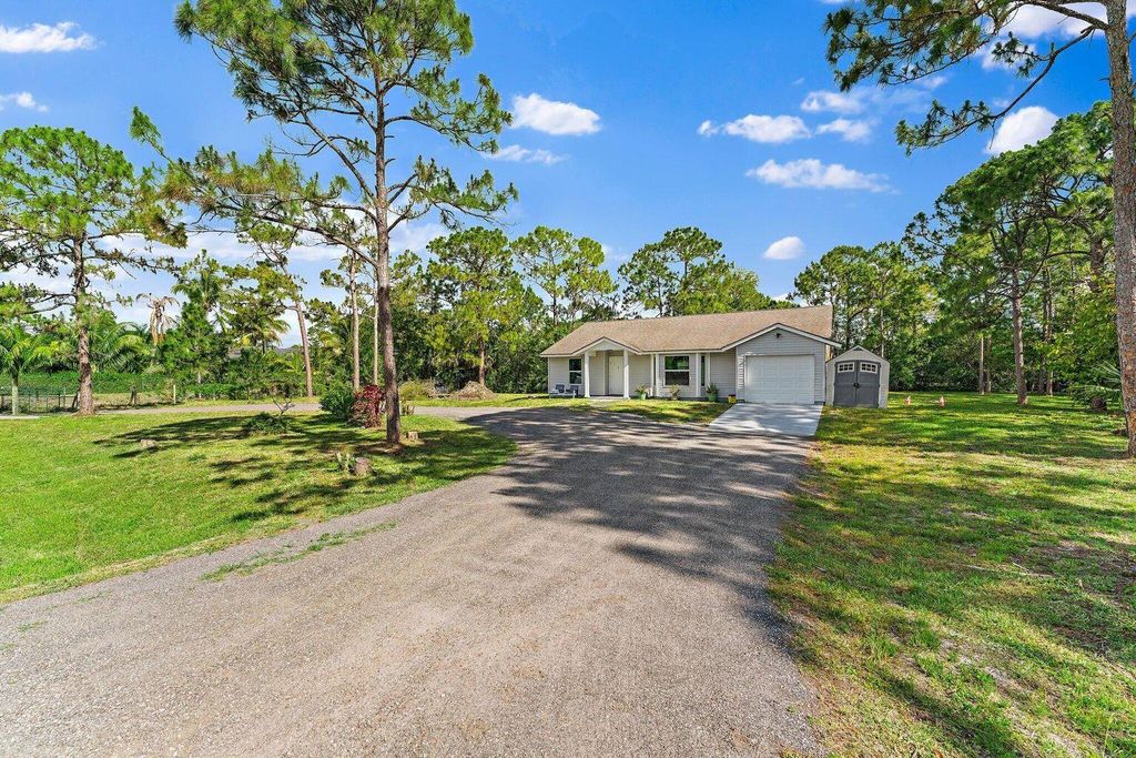 Photo of 12247 78th Place N, Loxahatchee, FL 33470 (MLS # R11100288)