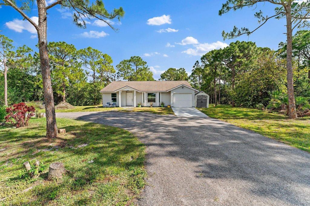 Photo of 12247 78th Place N, Loxahatchee, FL 33470 (MLS # R11100288)