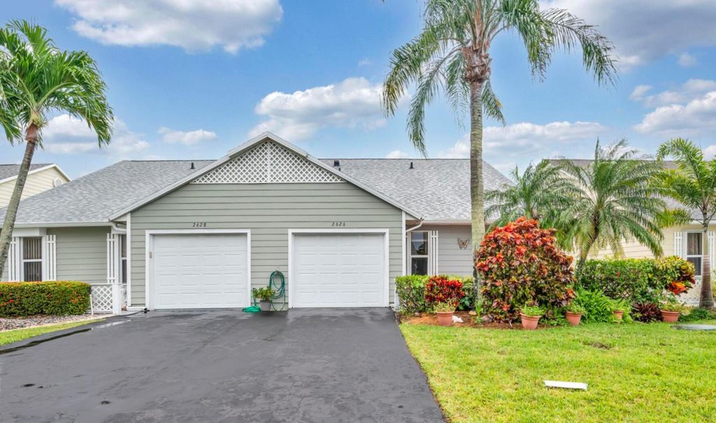 Photo of 2626 SE Tropical East Circle, Port Saint Lucie, FL 34952 (MLS # R11080819)