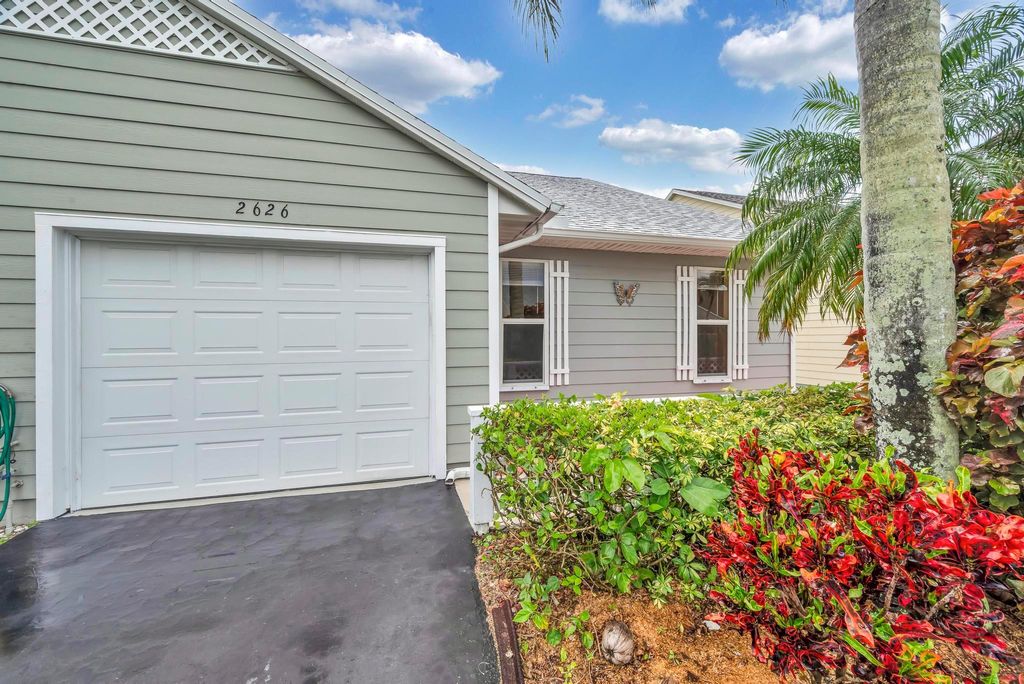 Photo of 2626 SE Tropical East Circle, Port Saint Lucie, FL 34952 (MLS # R11080819)