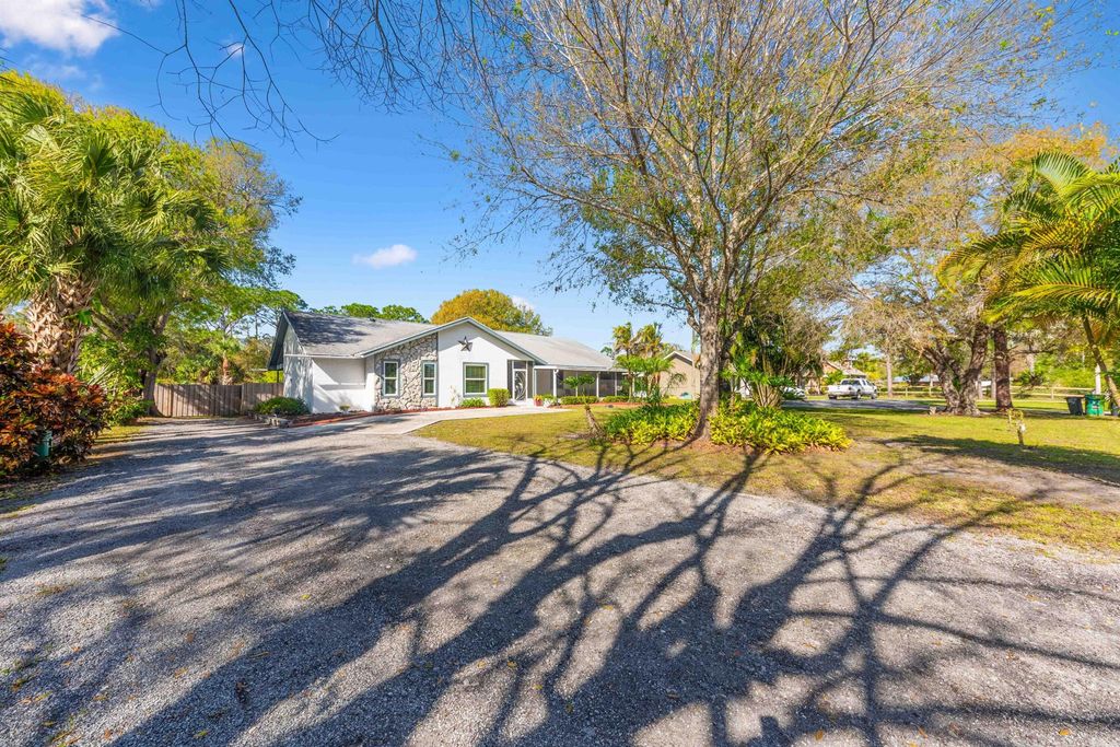 Photo of 4919 NW Pinetree Drive, Fort Pierce, FL 34982 (MLS # R10952350)