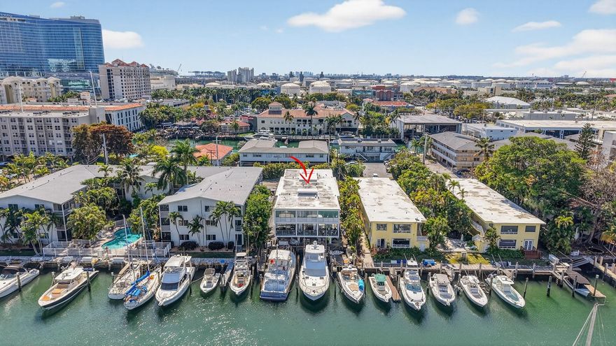 Welcome to this stylish townhome-style condominium in sought-after Harbordale, just off SE 15th Street in Fort Lauderdale. This updated two-story residence offers 2 spacious bedrooms, 2.5 bathrooms, and a bright open living and dining area perfect for everyday comfort and easy entertaining. The kitchen features stainless steel appliances, granite countertops, sleek modern cabinetry, and an in-unit washer and dryer, while the bathrooms have been thoughtfully renovated with contemporary finishes. Unwind on your private patio or balcony, enjoy assigned covered parking, and benefit from convenient kayak storage. Located just minutes from Las Olas, the beach, top shopping and dining, major highways, and the airport, this home delivers the best of South Florida living at an outstanding value.