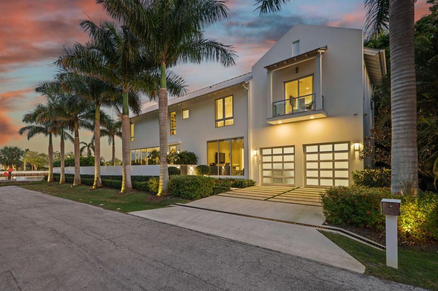Live effortlessly in this Waterfront Coastal Contemporary Oasis. Designed by Richard Jones and masterfully constructed by Azure in 2018. This recently completed residence offers private waterfront living in the highly sought-after Palm Trail neighborhood - an idyllic enclave celebrated for its charm, tranquility, and unparalleled setting. 920 showcases breathtaking Intracoastal views, direct water access, and a harmonious blend of luxury and coastal elegance. As you enter, you will discover radiant living spaces of glass walls and floor-to-ceiling glass doors that pocket away, seamlessly blending indoor and outdoor living. Elevated finishes enhance every detail, while the open-concept layout gracefully connects the gourmet kitchen, spacious living areas, and outdoor spaces making it ideal for hosting and relaxation. Outside, immerse yourself in the privacy of a walled, lushly landscaped garden and unwind on the expansive waterfront patio, complete with a heated salt chlorinated pool. This serene retreat offers a front-row seat to spectacular Intracoastal views.
The Palm Trail enclave, long regarded as one of Delray Beach's most desirable addresses, continues to experience a surge in demand, with rising lot values reflecting its coveted proximity to the town's cultural and culinary pulse. This rare waterfront offering in Palm Trail is a testament to refined, yet effortless coastal living.
