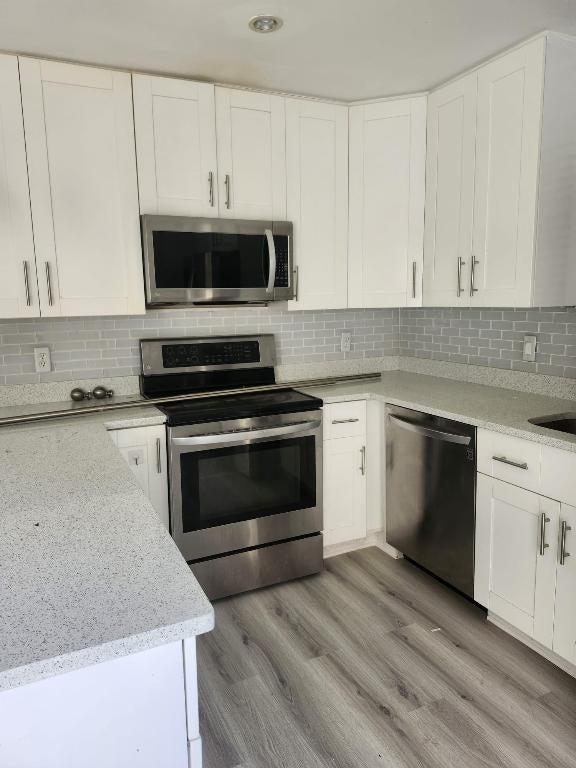 Photo of 7519 Courtyard Run E, Boca Raton, FL 33433 (MLS # R11158171)