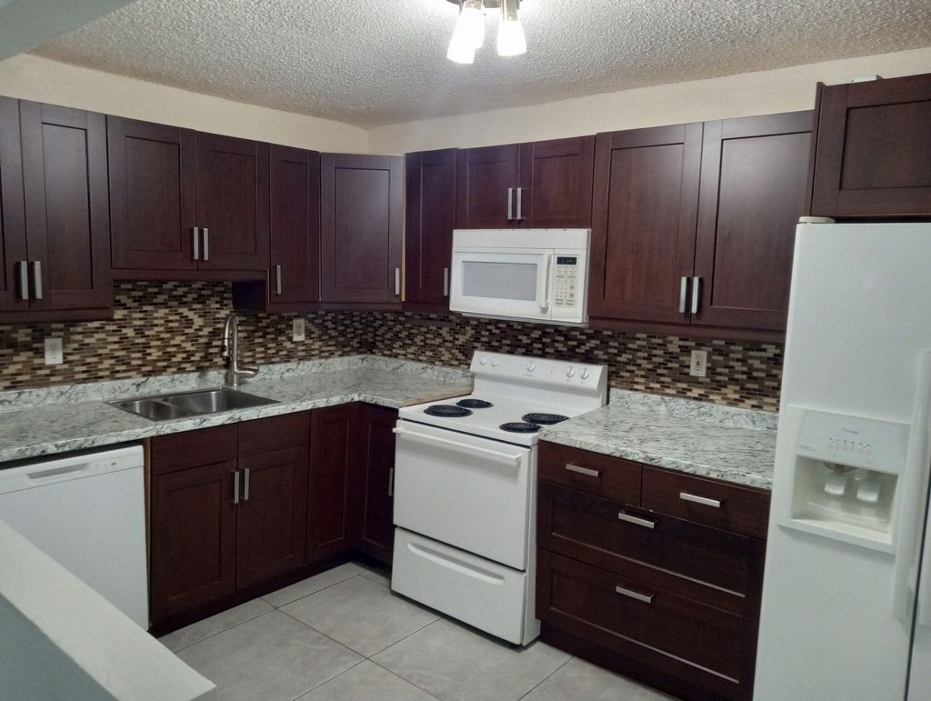 Photo of 4117 NW 88th Avenue #103, Coral Springs, FL 33065 (MLS # B26035439)