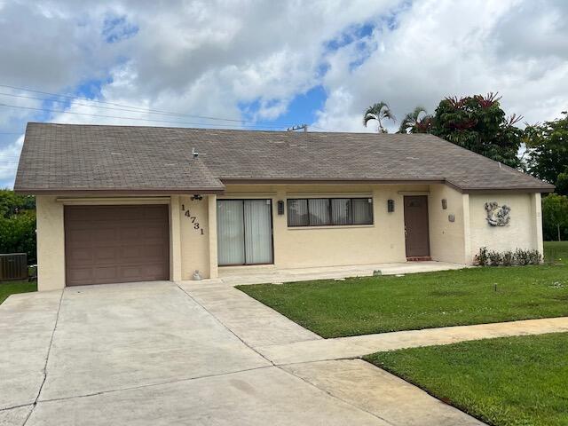 Spacious single family home on a .35 acre lot! Highly sought-after model with vaulted ceilings, an open kitchen/family room, and sliders in every room leading onto the oversized screened-in patio. very large (3/4 of an acre)fenced in backyard with room for a pool. Beautiful redone Master bathroom with double sinks. Double-wide driveway. AC 2007 Located in Coco Wood Lakes, a very pet friendly, 55+ community with a clubhouse, pool & spa, exercise room and seasonal entertainment. Minutes to the Delray Marketplace and the Florida Turnpike, and only 15 minutes to trendy downtown Delray and the beach.