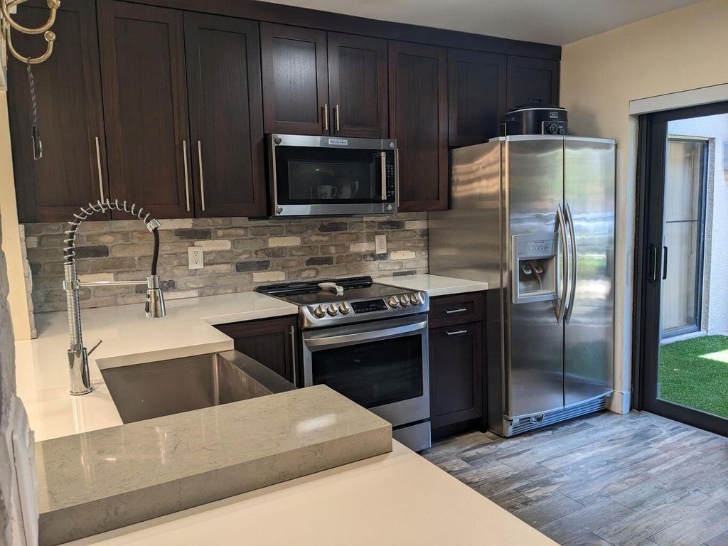 Photo of 400 Club Circle #107, Boca Raton, FL 33487 (MLS # R11106098)