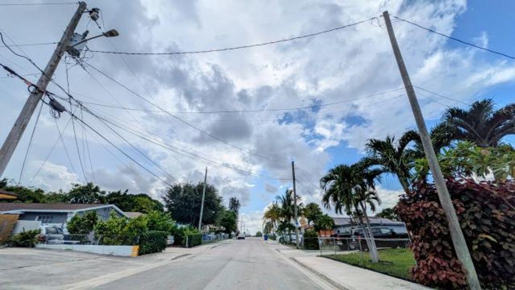 Photo of 1440 W Ac Evans Street, Riviera Beach, FL 33404 (MLS # R11131576)