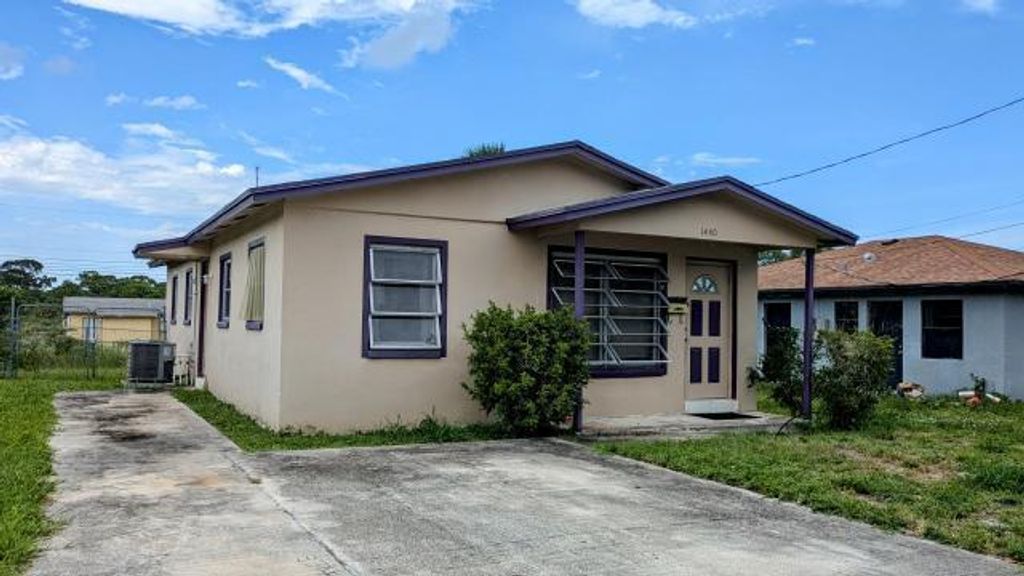 Photo of 1440 W Ac Evans Street, Riviera Beach, FL 33404 (MLS # R11131576)