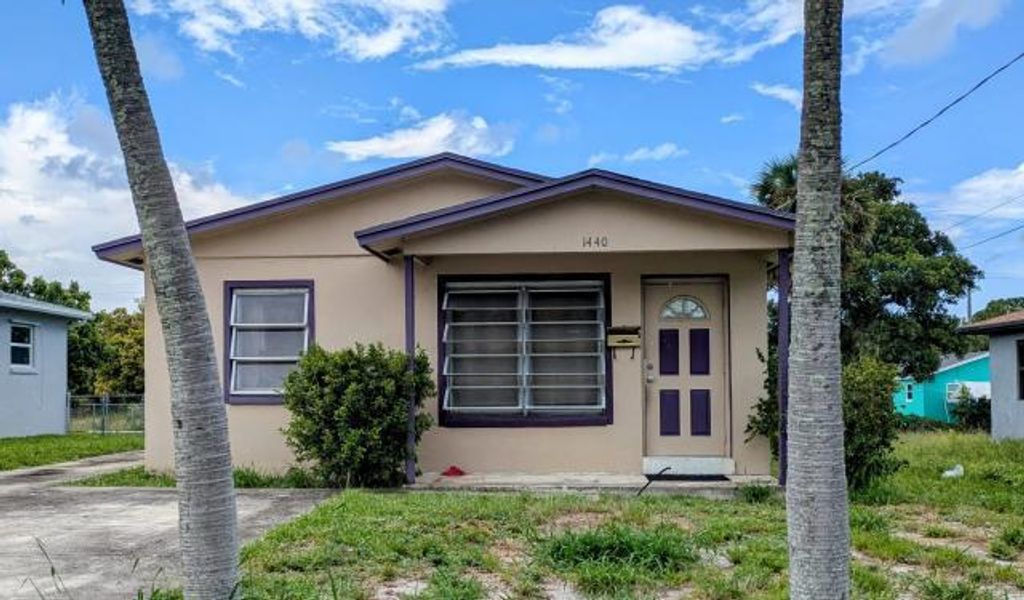 Photo of 1440 W Ac Evans Street, Riviera Beach, FL 33404 (MLS # R11131576)