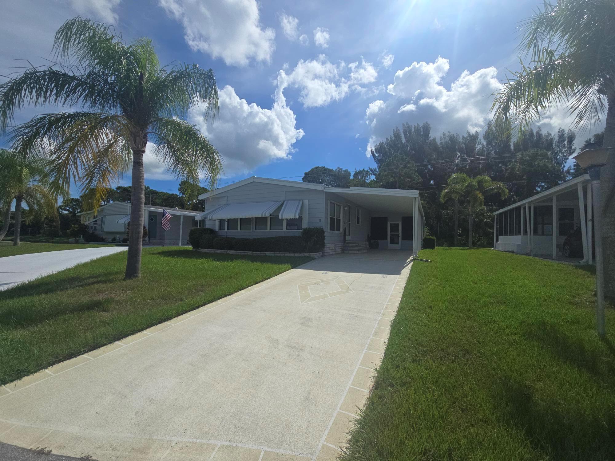 Spacious Furnished 2 Bed, 2 Bath - Cul-de-Sac Perimeter LotThis 1,416 sq. ft. furnished manufactured home offers comfort, style, and privacy. Features include a newer metal roof, newer AC (2023), bright windowed Florida room, and island kitchen perfect for entertaining. Enjoy abundant storage, a peaceful wooded backdrop, and a quiet cul-de-sac location. Move-in ready and waiting for you!