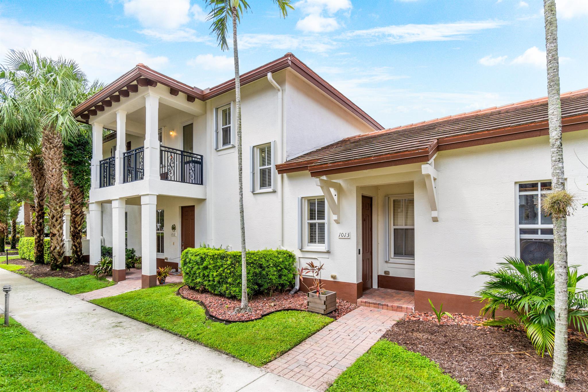 Your dream 2nd floor condo with 1 car garage at 4760 Mimosa Place in the vibrant heart of Coconut Creek where elegance meets convenience awaits! Perfect for families & working professionals seeking a blend of comfort & style, this property boasts 3 spacious bedrooms & 2 modern bathrooms and two darling balconies to unwind or start your day!As you step inside this freshly painted home, you're greeted by upgraded floors that lead to a large open family room space, complete with a cozy dining area and open kitchen. The primary bedroom is a serene retreat featuring a luxurious garden tub, and all bedrooms offer oversized comfort with closets for ample storage. The open kitchen offers granite countertops and stainless steel appliances, making meal prep a pleasure.