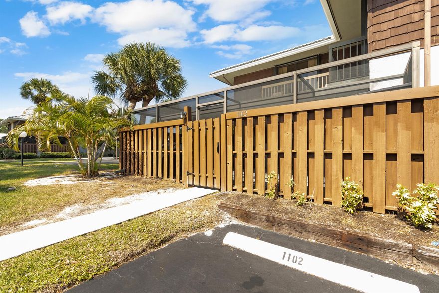 Welcome to Camelot Gardens! Located in East Port St Lucie, you are close to the beaches, retail & restaurants, and the major HCA Hospital. Enjoy the privacy of this end unit 2 Bed, 2.5 Bath Townhome with a massive screened & covered patio, perfect for entertaining and indoor-outdoor living. The owner's suite is spacious with it's own walk-in closet, vaulted ceiling, and private bath. And both bedrooms have sliders with accordion shutters to access the balcony. Just steps away from the community pool, tennis courts, and clubhouse, and the association covers the roof and exterior maintenance along with your water, sewer, cable, and internet. Brand new carpet installed 8/25.
