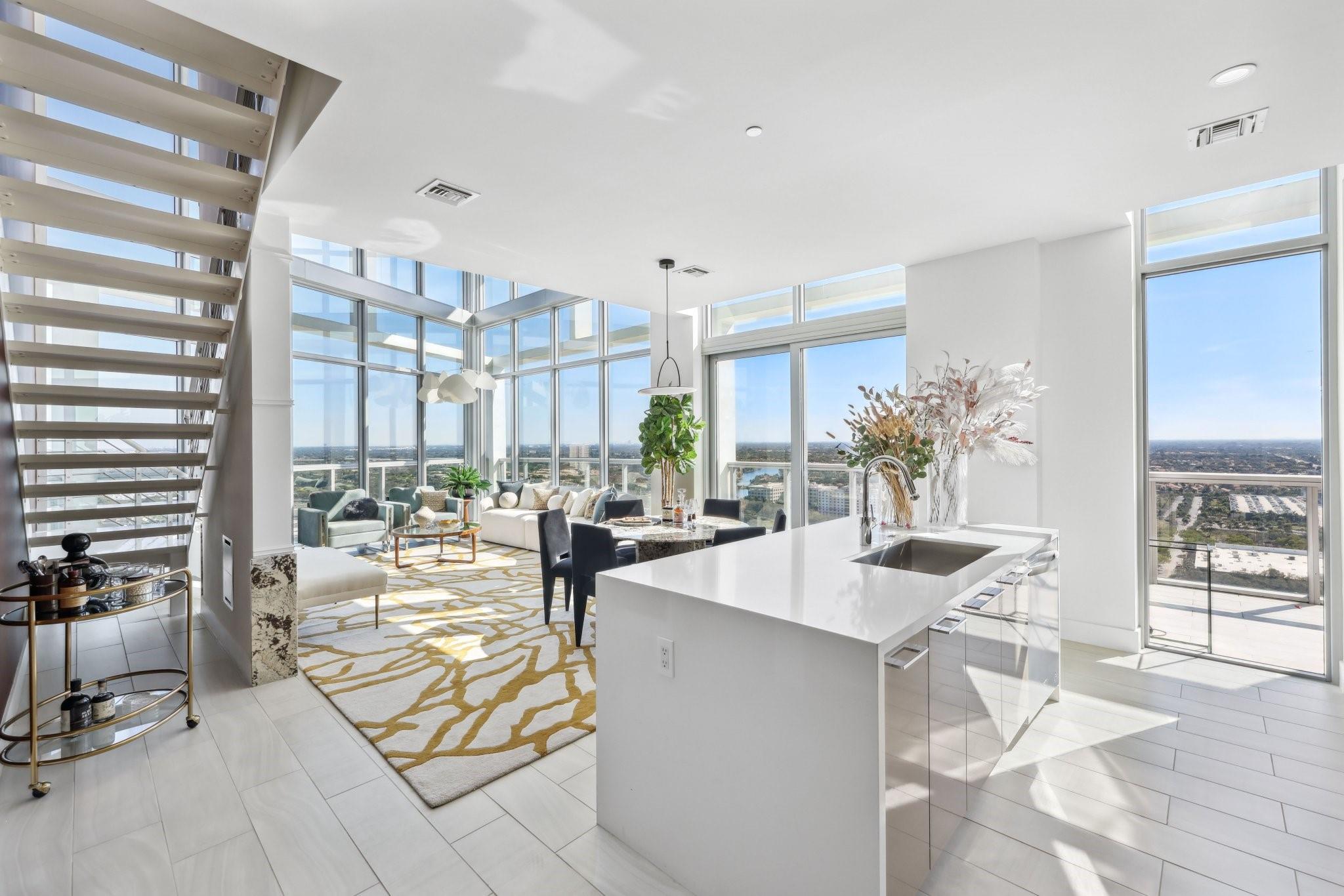 Experience modern elegance in this two-story penthouse at Metropica, offering floor-to-ceiling windows, open living spaces and an expansive private terrace with breathtaking views. Designed for sophistication, each residence features high-end finishes, European-style cabinetry, quartz countertops and premium appliances. The primary suite boasts a spa-inspired bath, dual vanities and a soaking tub, with additional rooms for guests or office space. Be the first to call this stunning, new penthouse home! Enjoy resort-style amenities, including a pool, fitness center, sauna, clubhouse, tennis courts, kids playroom and 24/7 security. Steps from Sawgrass Mills Mall, Amerant Arena, restaurants and major highways. Choose from four different penthouse floor plans. ASK ABOUT THE 5% DEVELOPER CREDIT!