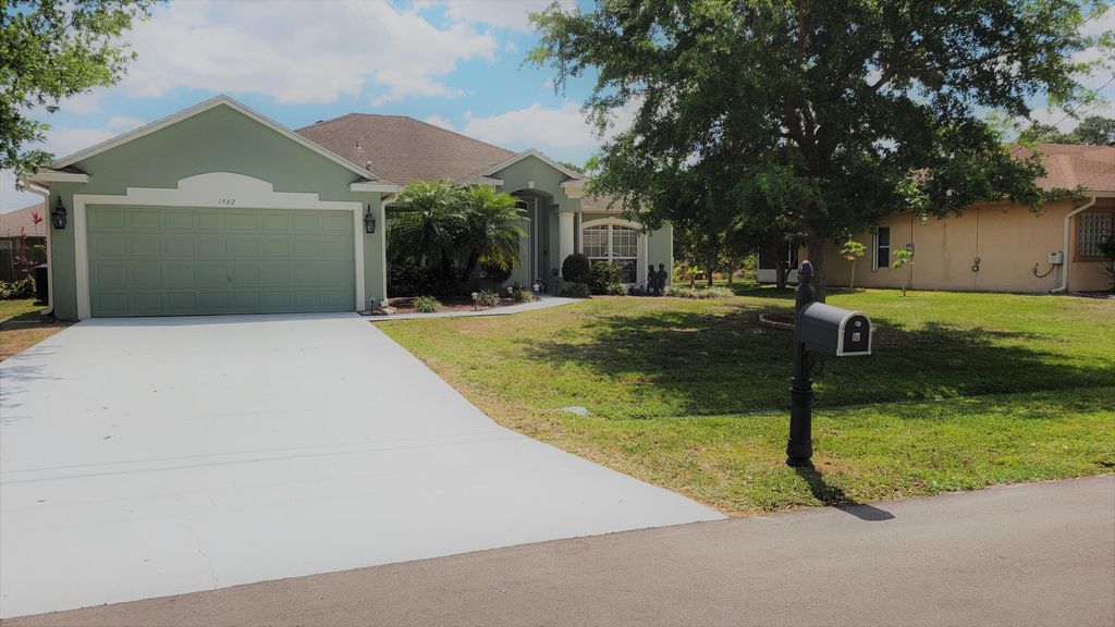 Photo of 1562 SW Neponset Road, Port Saint Lucie, FL 34953 (MLS # R10790541)