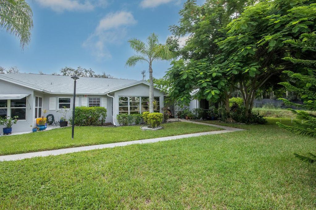 Photo of 14412 Canalview Drive #C, Delray Beach, FL 33484 (MLS # R11124023)