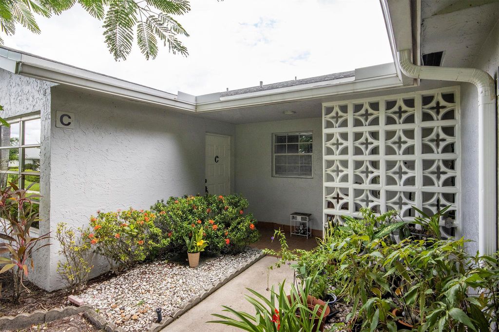 Photo of 14412 Canalview Drive #C, Delray Beach, FL 33484 (MLS # R11124023)