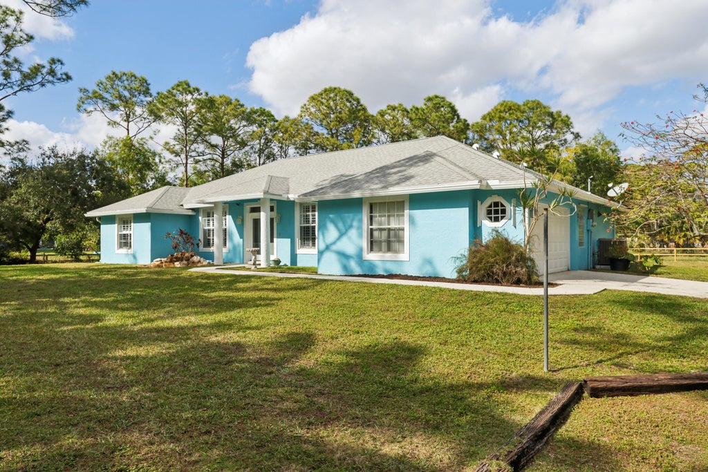 Photo of 13707 47th Court N, The Acreage, FL 33411 (MLS # R11053977)