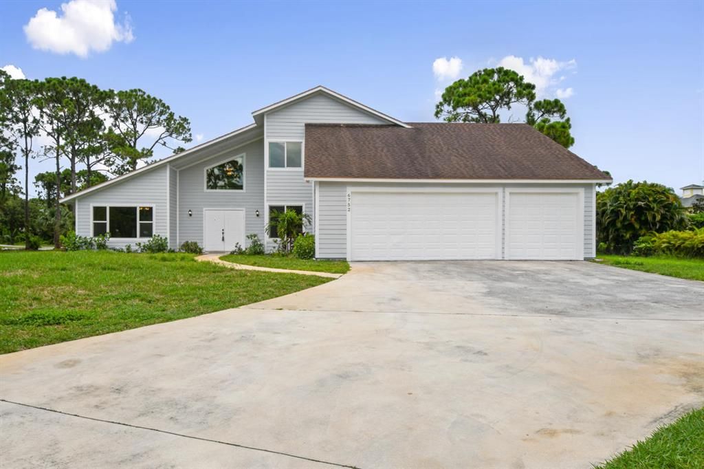 Photo of 6752 149th Place N, West Palm Beach, FL 33418 (MLS # R10753341)