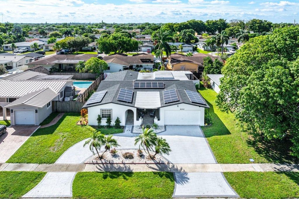 Photo of 9040 NW 20th St, Pembroke Pines, FL 33024 (MLS # F10532917)