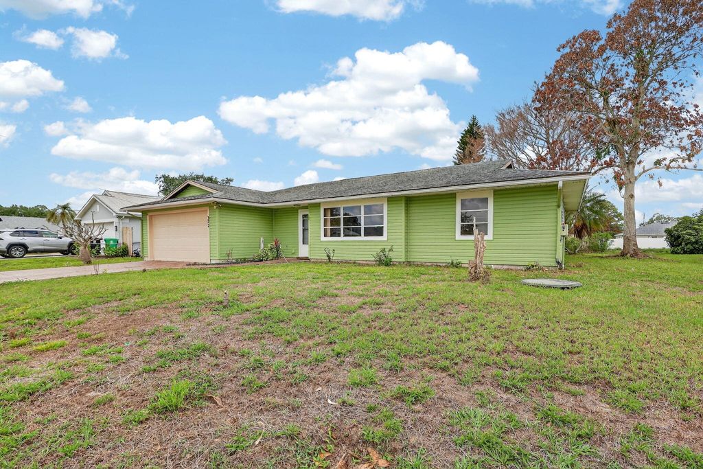 Photo of 372 SW Carter Avenue, Port Saint Lucie, FL 34983 (MLS # B26011235)