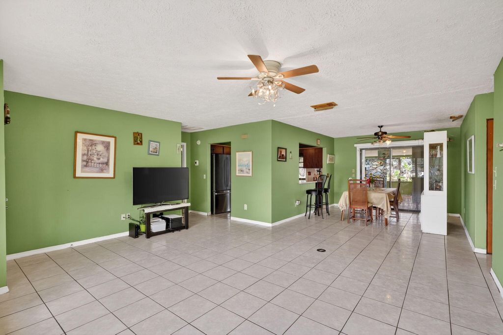 Photo of 372 SW Carter Avenue, Port Saint Lucie, FL 34983 (MLS # B26011235)