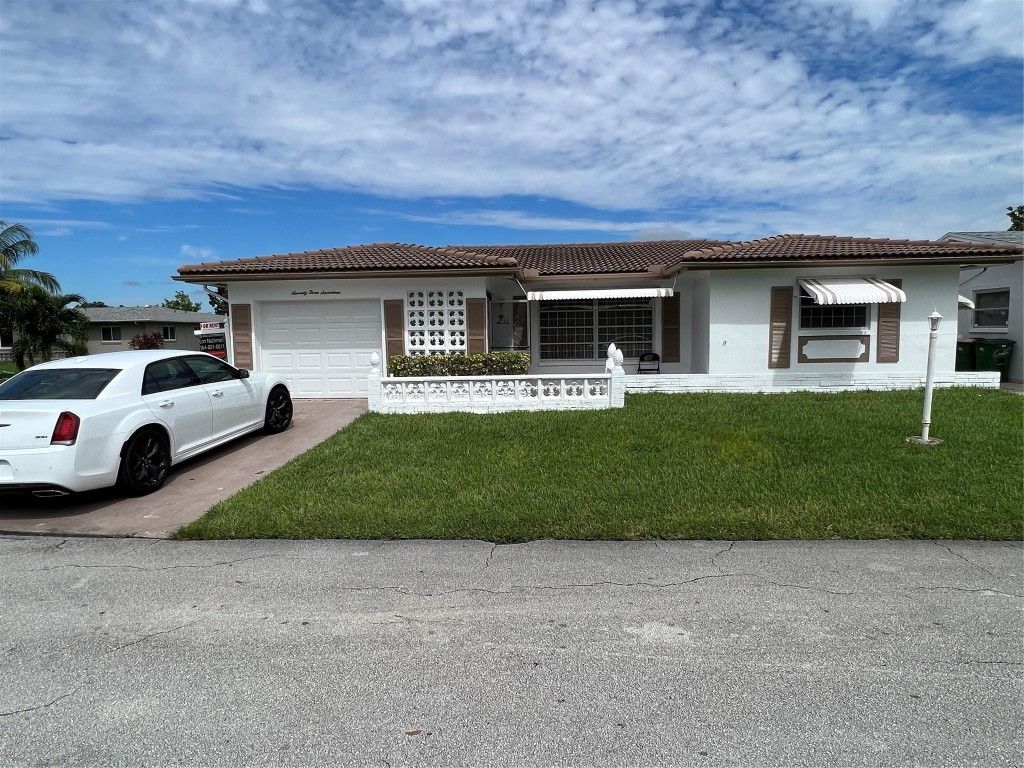 Photo of 7317 NW 57th Place, Tamarac, FL 33321 (MLS # F10545756)