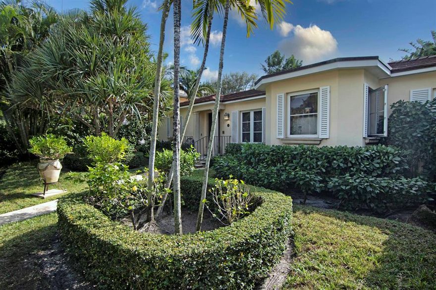 Located in the heart of West Palm's prestigious El Cid, this lake block property is truly an Oasis. The main house provides 2 bedrooms and 2 baths and a beautiful gourmet chef's kitchen with a Viking gas range. The spacious living and family rooms both showcase through French doors, the wonderful covered outdoor living and fabulous 'resort style' pool setting bordered by amazing mature landscaping and one of the nicest two story guest houses in all of El Cid! The guest house has 2 bedrooms, 1 bath and a 1 car garage. All the windows and doors are impact rated.