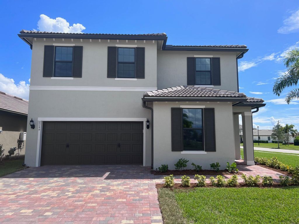 Photo of 8246 Cadre Noir Road, Lake Worth, FL 33467 (MLS # R11169608)
