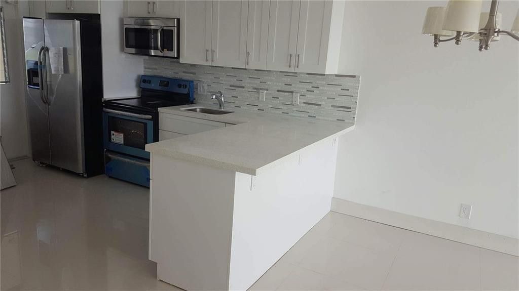 Photo of 3150 N Course Lane #607, Pompano Beach, FL 33069 (MLS # B26033224)
