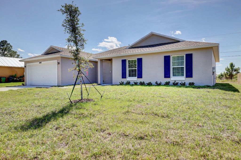 Photo of 3425 SW Europe Street, Port Saint Lucie, FL 34953 (MLS # R11158437)