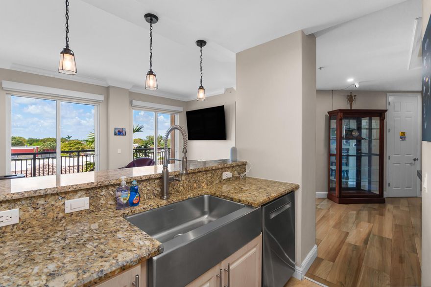 Gracious Living at Wilton Station. Two Bedroom & Two Bathroom Split Floor Plan with easy access underground Parking under the unit. This apartment features polished wood-look porcelain tiles, tray ceilings, kitchen with stainless appliances and farmhouse sink, custom cabinetry throughout, and the custom primary bathroom has wood-look tiles throughout, frameless glass, bidet, walk-in tub, rain shower and black fixtures. Outdoors you will enjoy the resort-style pool and large clubhouse with gym, media room, billiards, library, warming kitchen, and party rooms. Bicycle and kayak/canoe storage available. HOA includes internet, cable, master insurance, water, sewer, trash, landscaping, gatehouse, pool, clubhouse, and management. Gated, pet-friendly community.