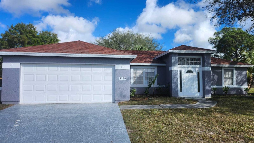 Photo of 1155 SW ALEXANDRIA Avenue, Port Saint Lucie, FL 34953 (MLS # B26068891)
