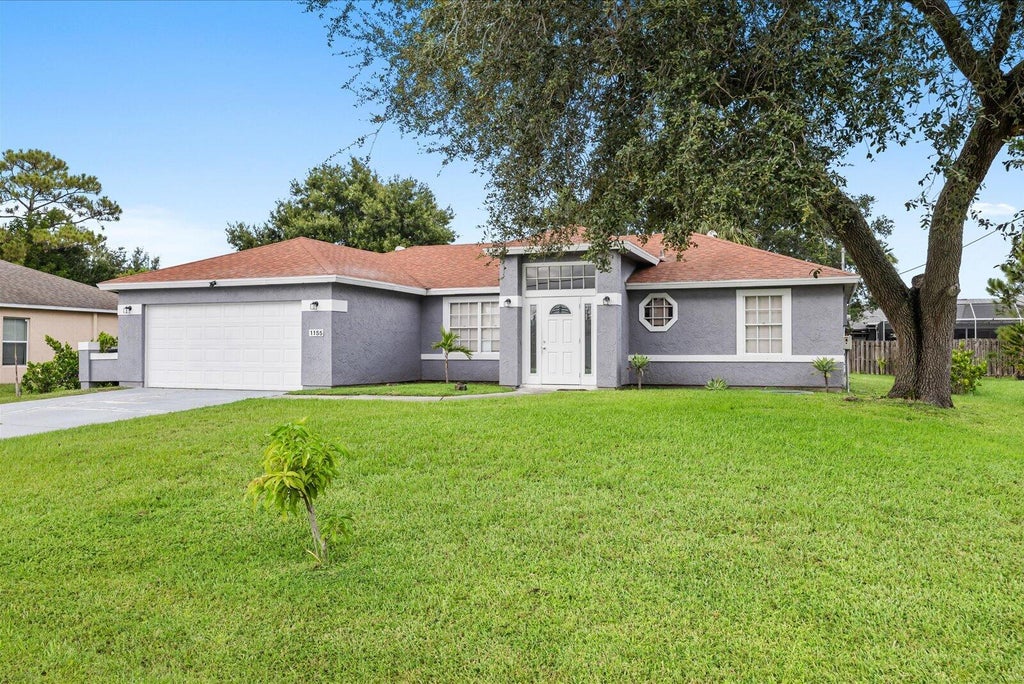 Photo of 1155 SW ALEXANDRIA Avenue, Port Saint Lucie, FL 34953 (MLS # B26068891)