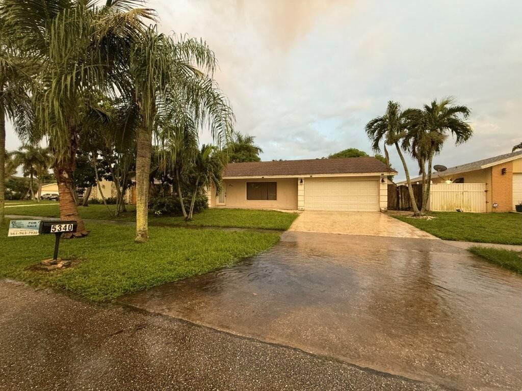 Photo of 5340 Guildcrest Street, Lake Worth, FL 33463 (MLS # R11132618)