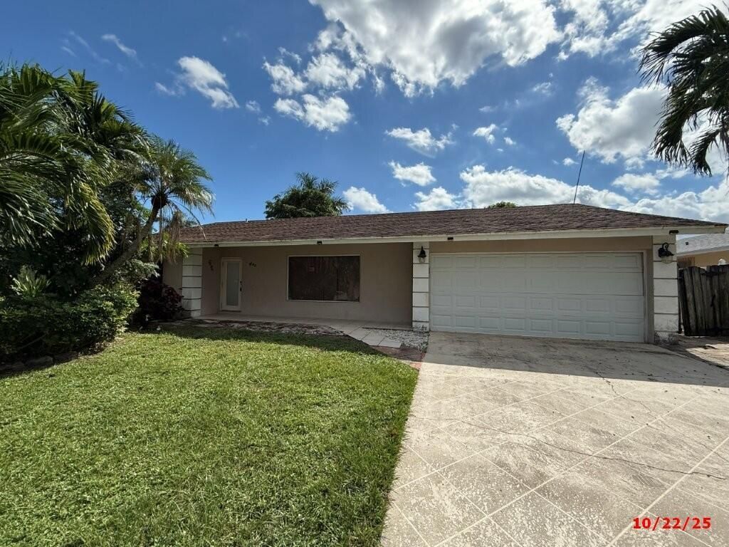 Photo of 5340 Guildcrest Street, Lake Worth, FL 33463 (MLS # R11132618)