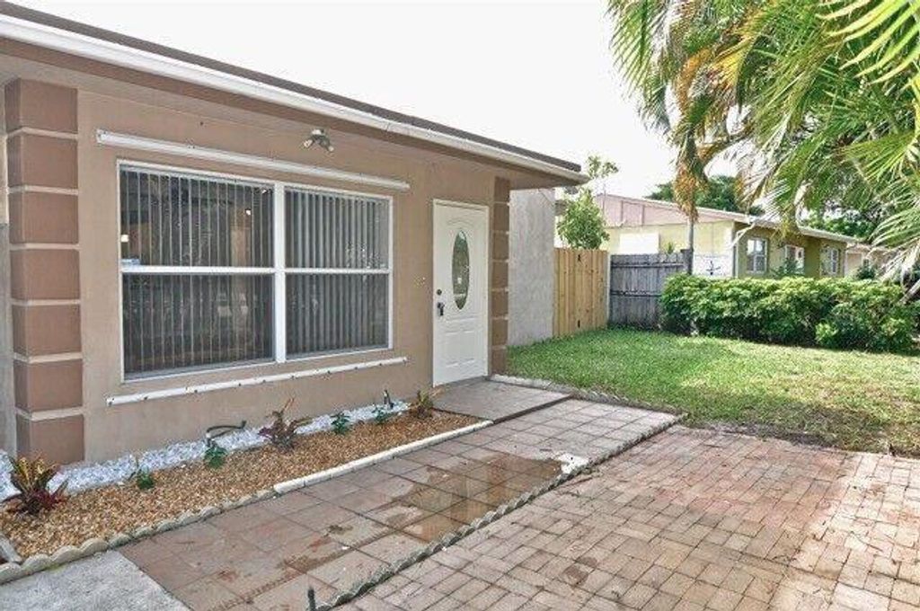 Photo of 472 Seminole Drive, Atlantis, FL 33462 (MLS # R10979043)