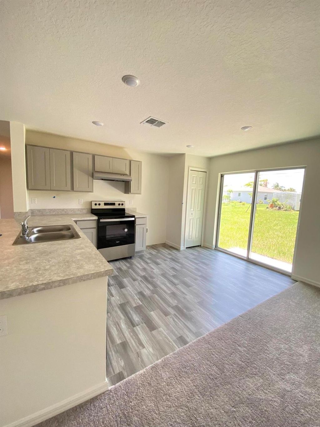 Photo of 982 SW Gaitor Avenue, Port Saint Lucie, FL 34953 (MLS # R11105017)