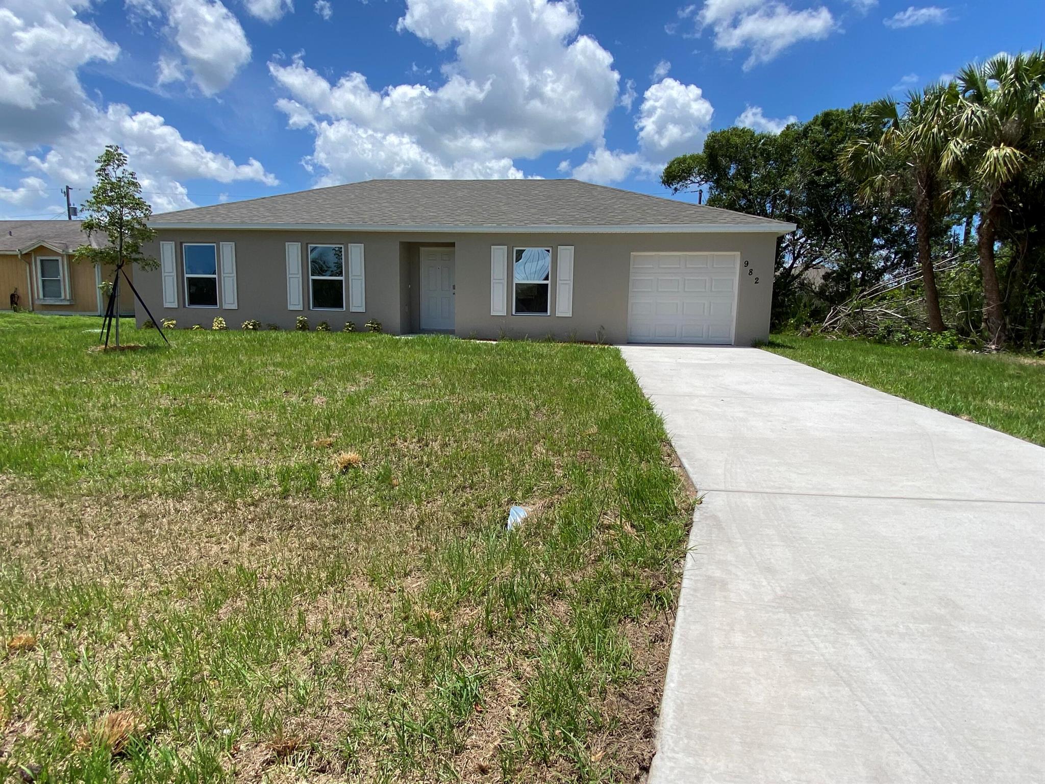 New on the market! This house offers 3 bedrooms, 2 bathrooms, with a 2 car garage. Available for immediate move in with acceptable background and credit reports. Carpet in Living room is being replaced with new vinyl flooring. A fence will be installed!Close to I'95 and the turnpike