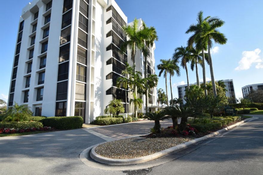 Lakewood 3rd floor 2 bedroom, 2 bath corner midrise apartment. Choice SE exposure with unobstructed wrap around lake and golf course views in both directions plus view of community pool. 16'' Tile floors set on a diagonal in the living areas. Small patio glassed in and opened to the dining room and kitchen. Updated kitchen and bathrooms. Popcorn removed from ceilings. Storm shutters on main patio. Covered parking space. Offered unfurnished with furnishings negotiable. Club membership required at $70,000.