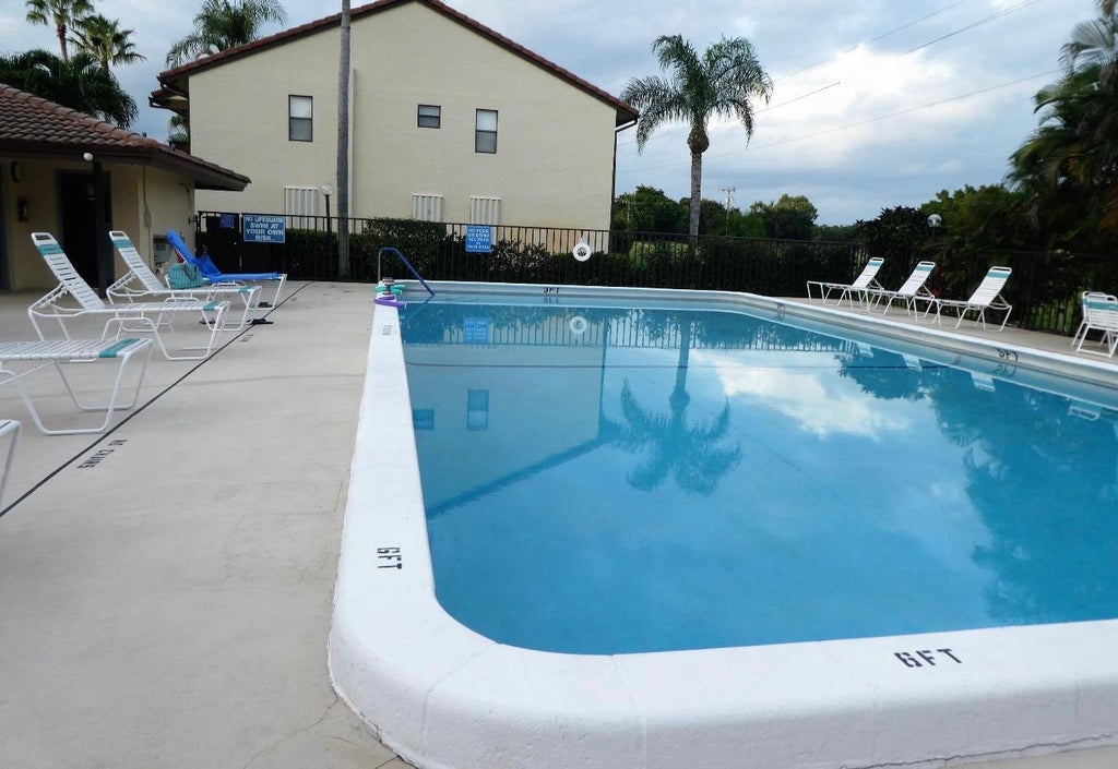 Photo of 7069 Golf Colony Court #102, Lake Worth, FL 33467 (MLS # B26086677)